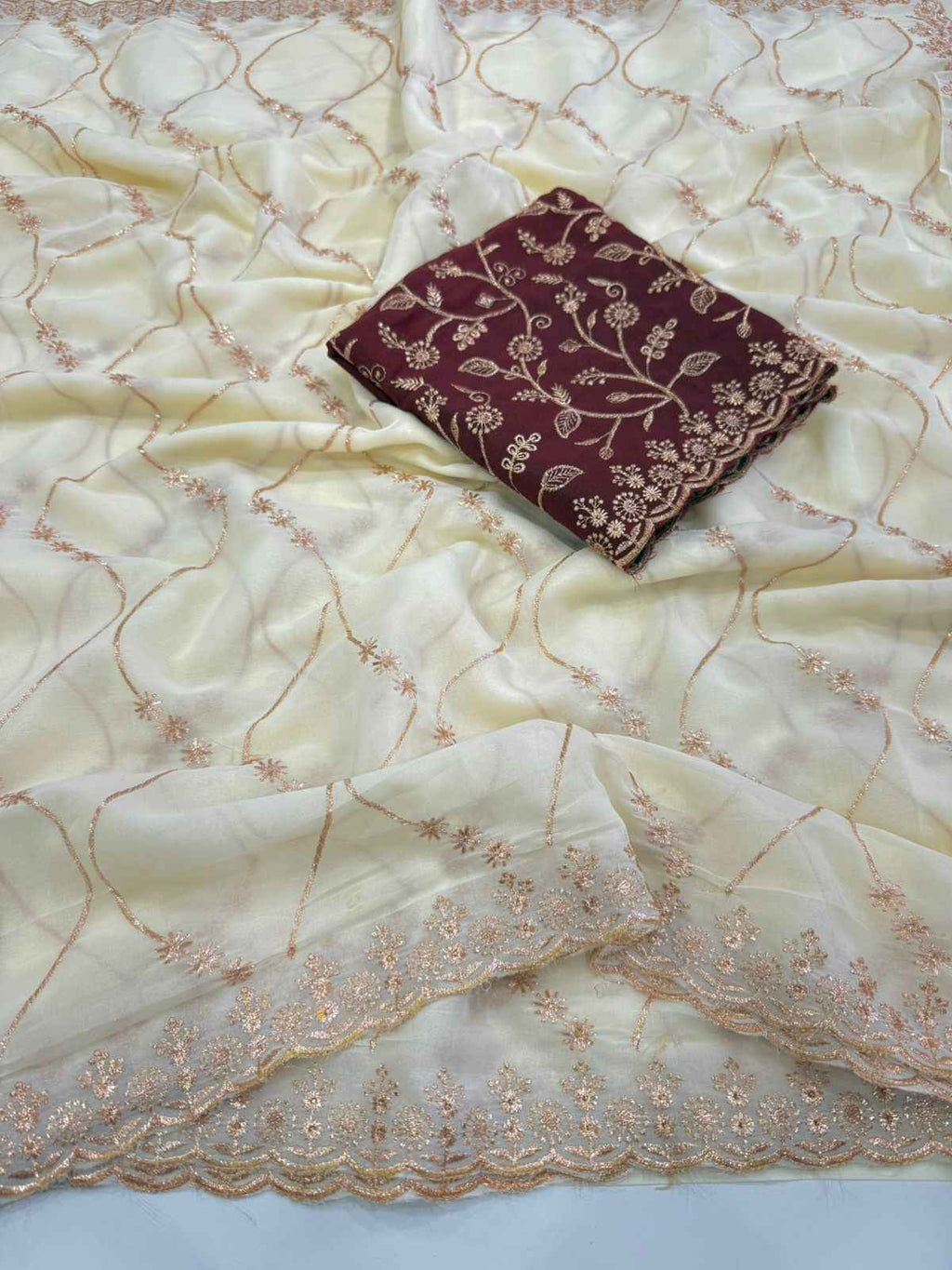 Ivory Charm Georgette Embroidered Saree