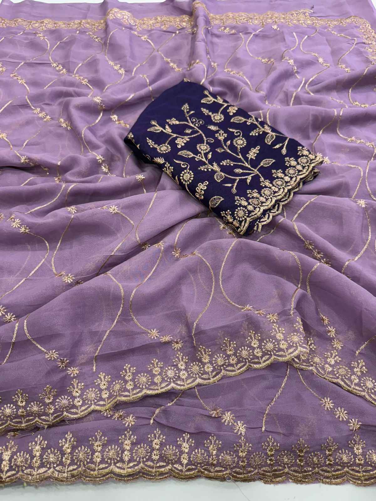 Mauve Majesty Georgette Embroidered Saree